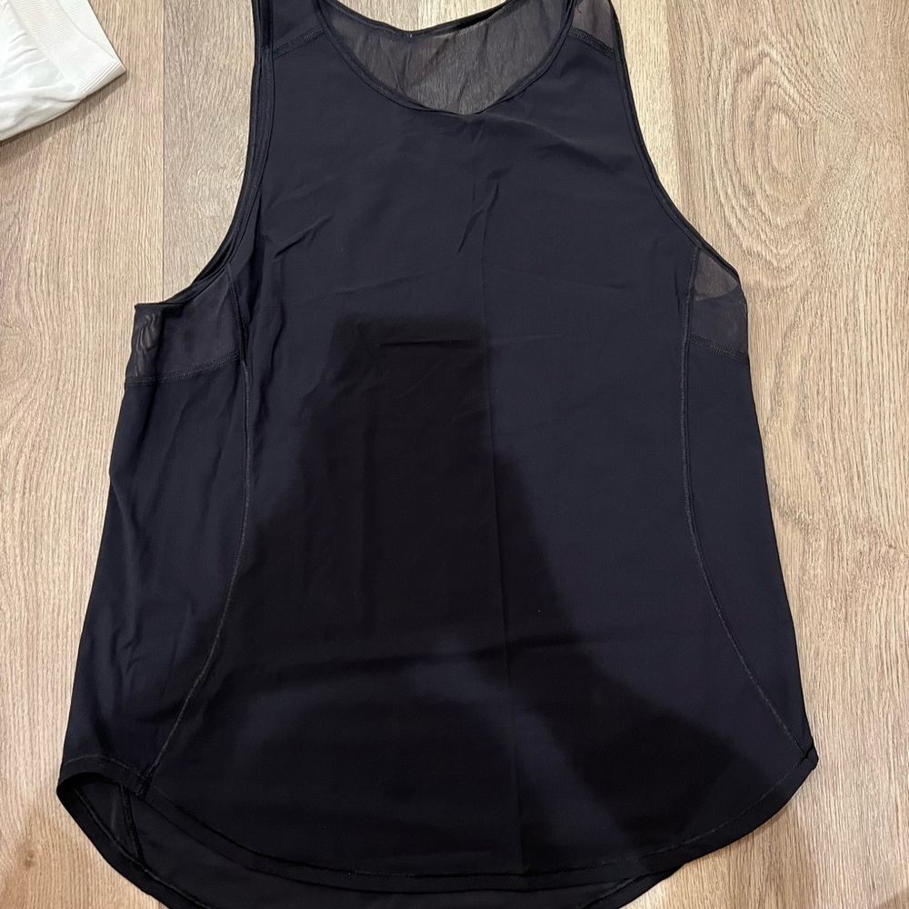 Black lululemon tank top. Size 6